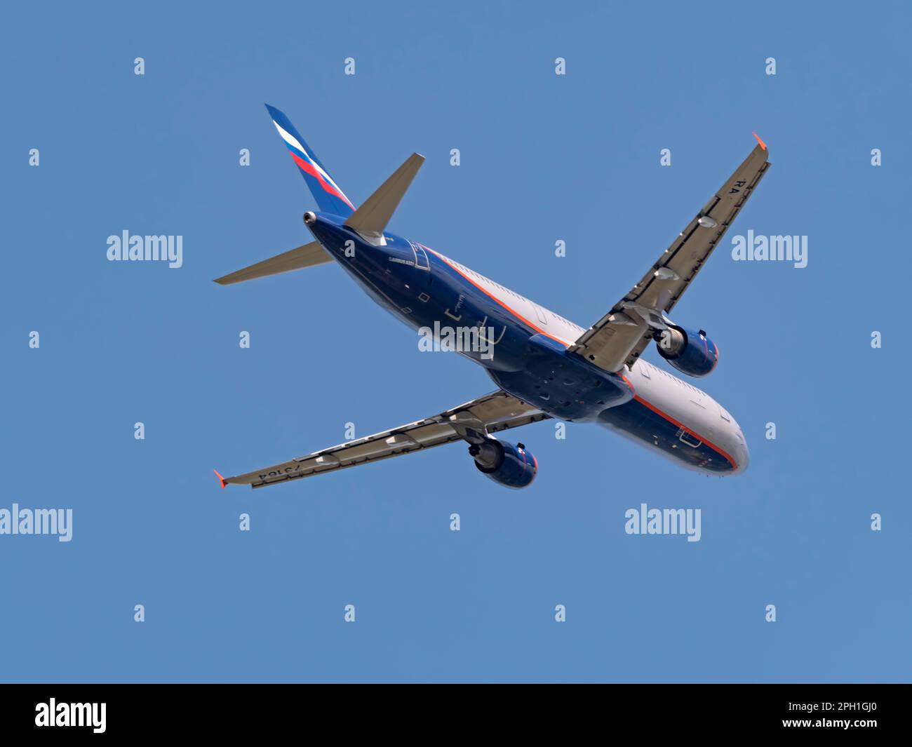 MOSCOW , RUSSIA, June 10, 2019: The Commercial passenger airplane flying overhead on sunny day on June 10, 2019 in Moscow, Russia. Stock Photo