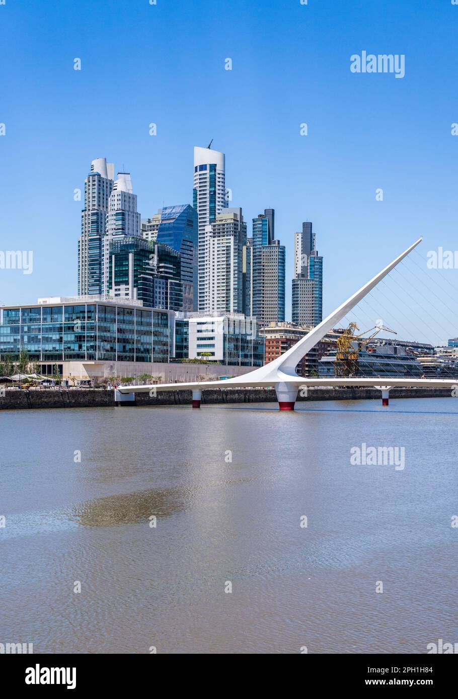 Footbridge and modern offices and apartments in Puerto Madero district of Buenos Aires Stock Photo