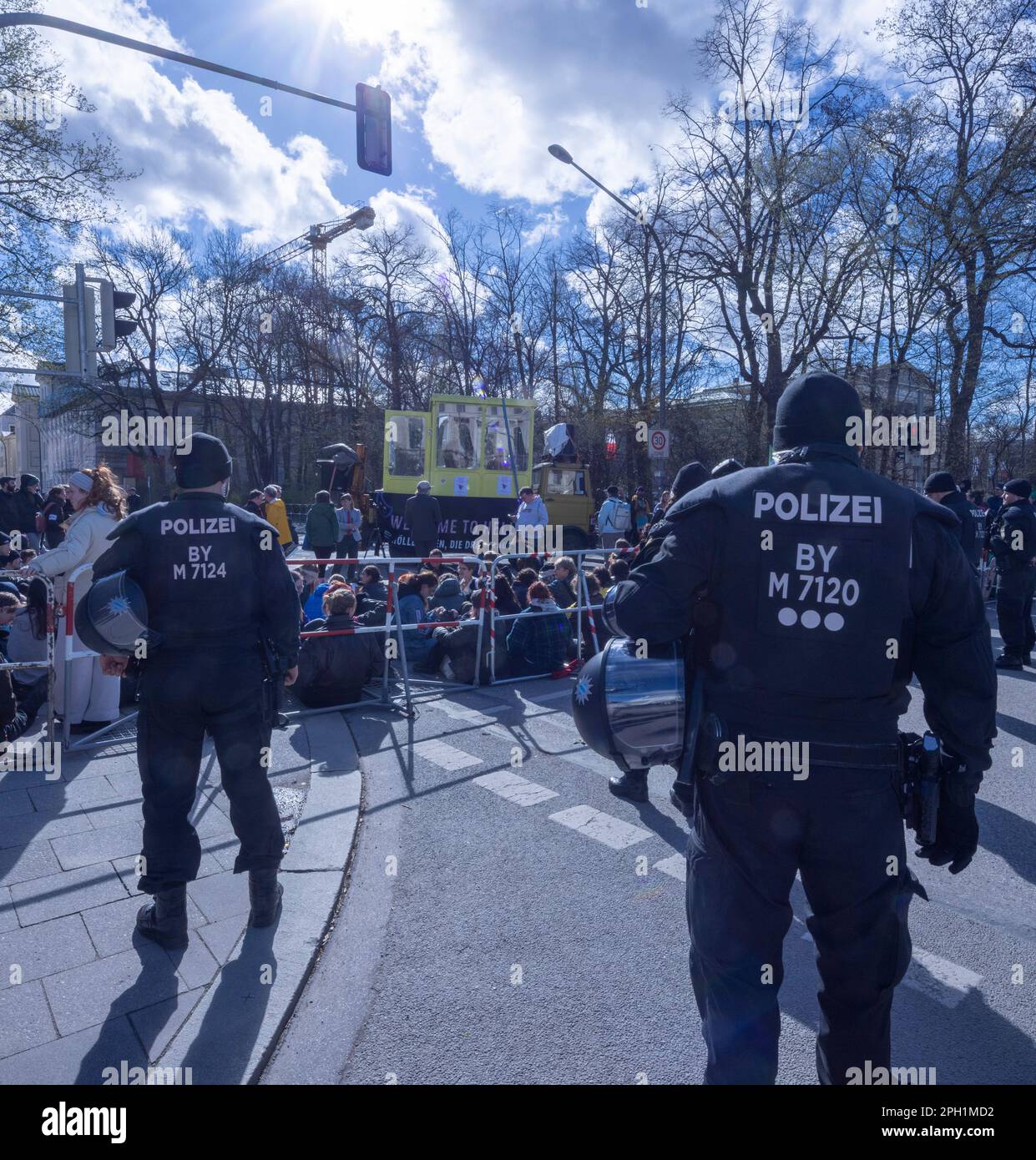Munich, Germany. 25 March 2023. Police watch over pro-choice supporters near the route of ananti-abortion march, Munich, Germany Stock Photo
