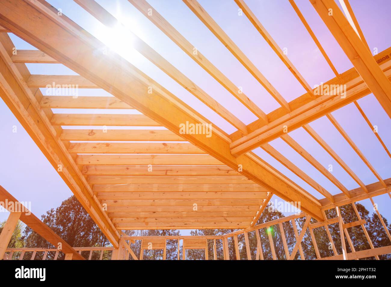 An underlying framing beam provides support for layout of joists in