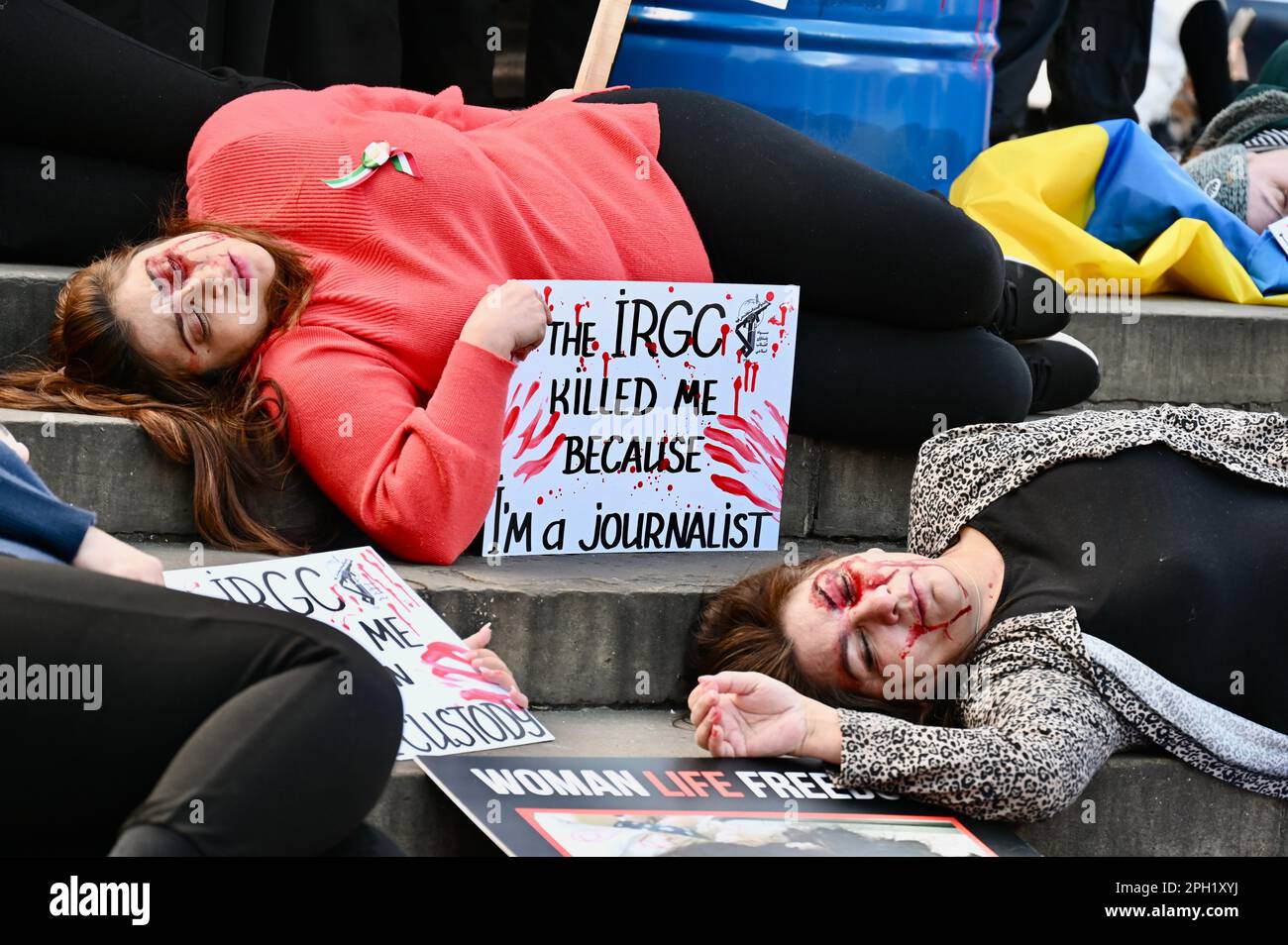 London, UK. Two organisations, Stage of Freedom and Women Fight 4ua, came together at a rally in Piccadilly Circus calling for Freedom for Iran and an end to the Russian Invasion of Ukraine. Credit: michael melia/Alamy Live News Stock Photo