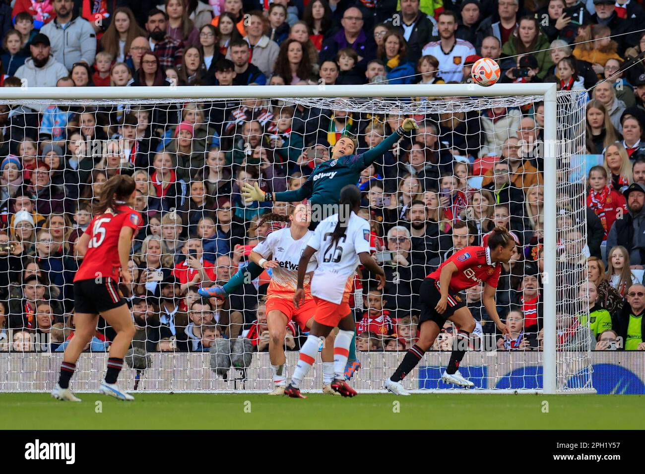 Mackenzie Arnold #1 of West Ham United makes a save during the FA Women's Super League match Manchester United Women vs West Ham United Women at Old Trafford, Manchester, United Kingdom, 25th March 2023  (Photo by Conor Molloy/News Images) Stock Photo