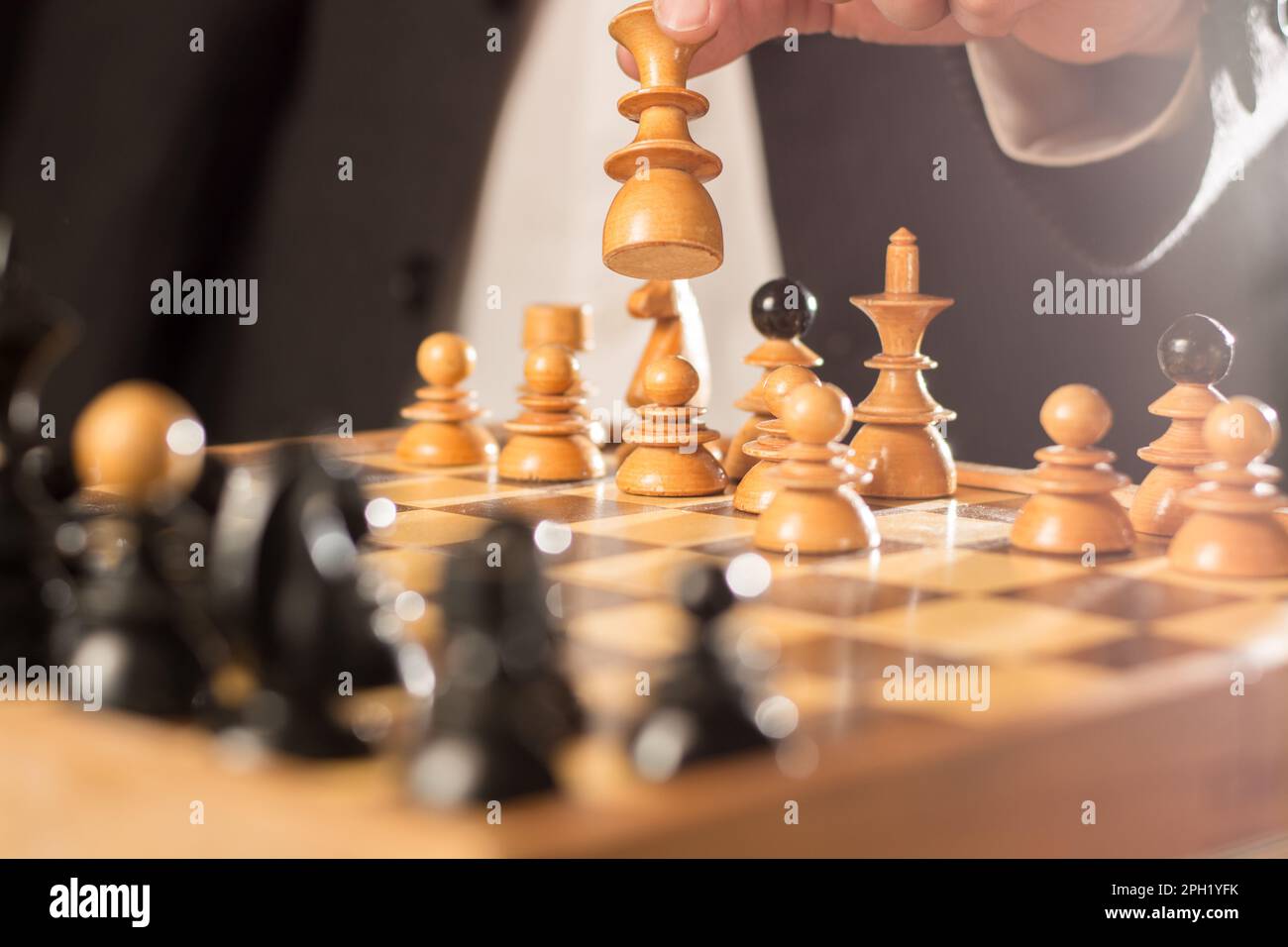 chess player plays at the chessboard Stock Photo - Alamy