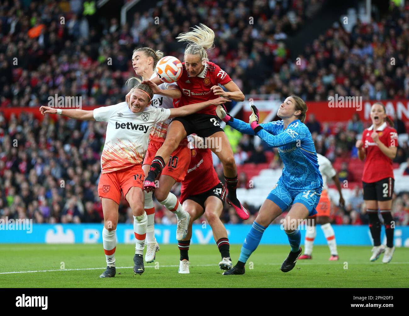 West Ham United's Amalie Thestrup and Manchester United's Millie Turner
