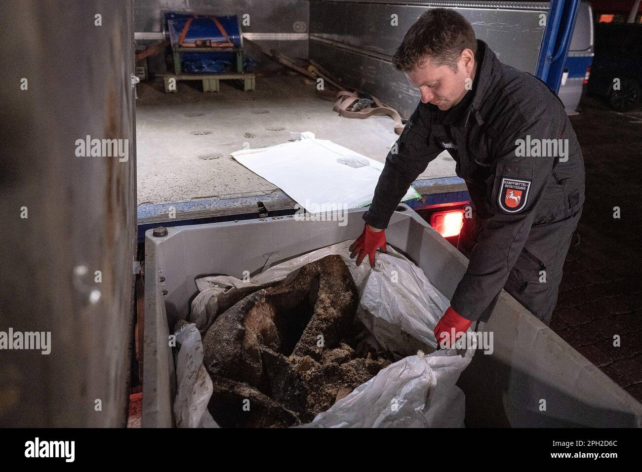 25 March 2023, Lower Saxony, Göttingen: An employee of the Explosive ...