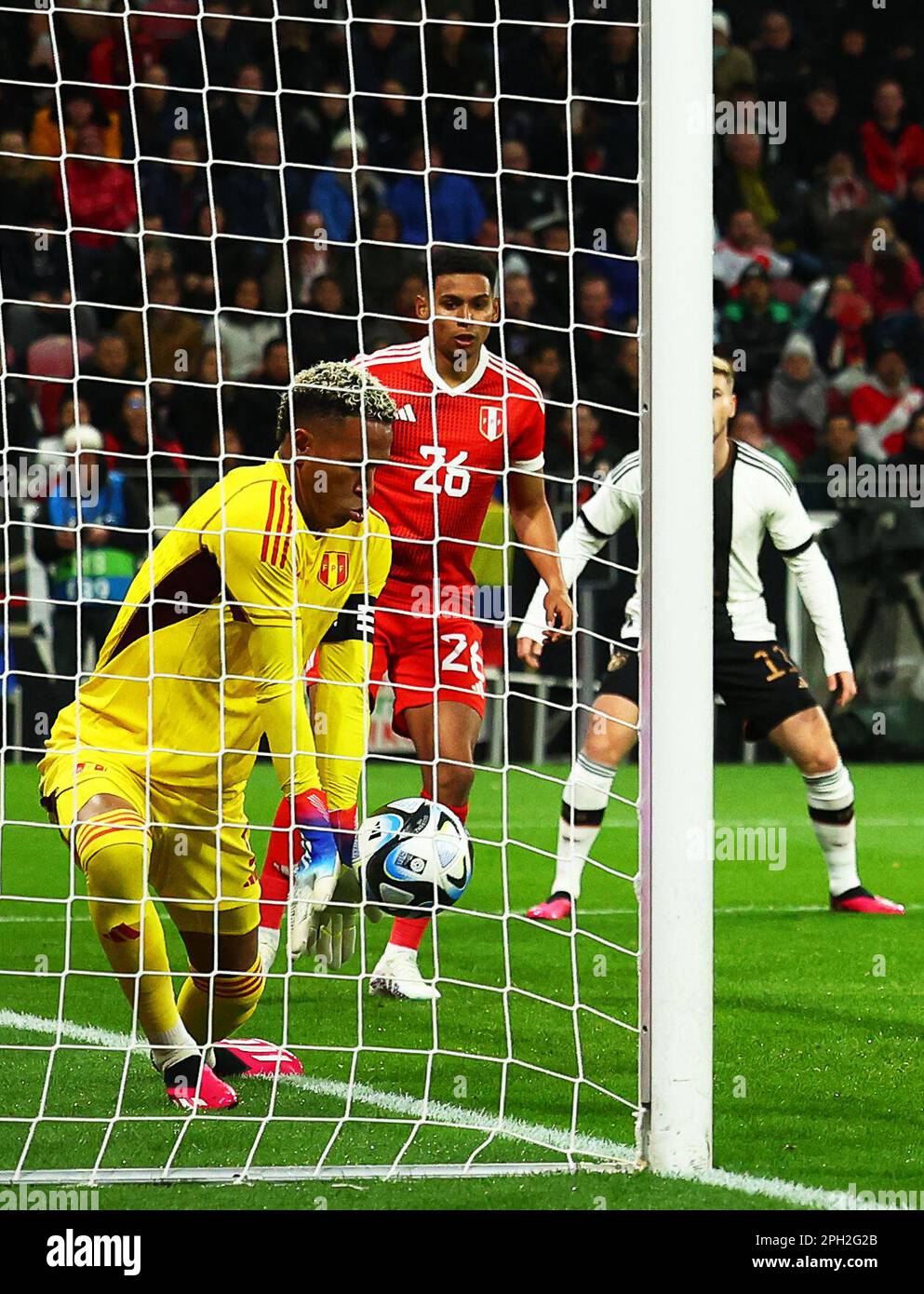 Mainz, Germany. 25th Mar, 2023. Soccer: internationals, Germany - Peru, Mewa Arena. Peru's goalkeeper Pedro Gallese (l) stops the ball over the goal line. Credit: Christian Charisius/dpa/Alamy Live News Stock Photo