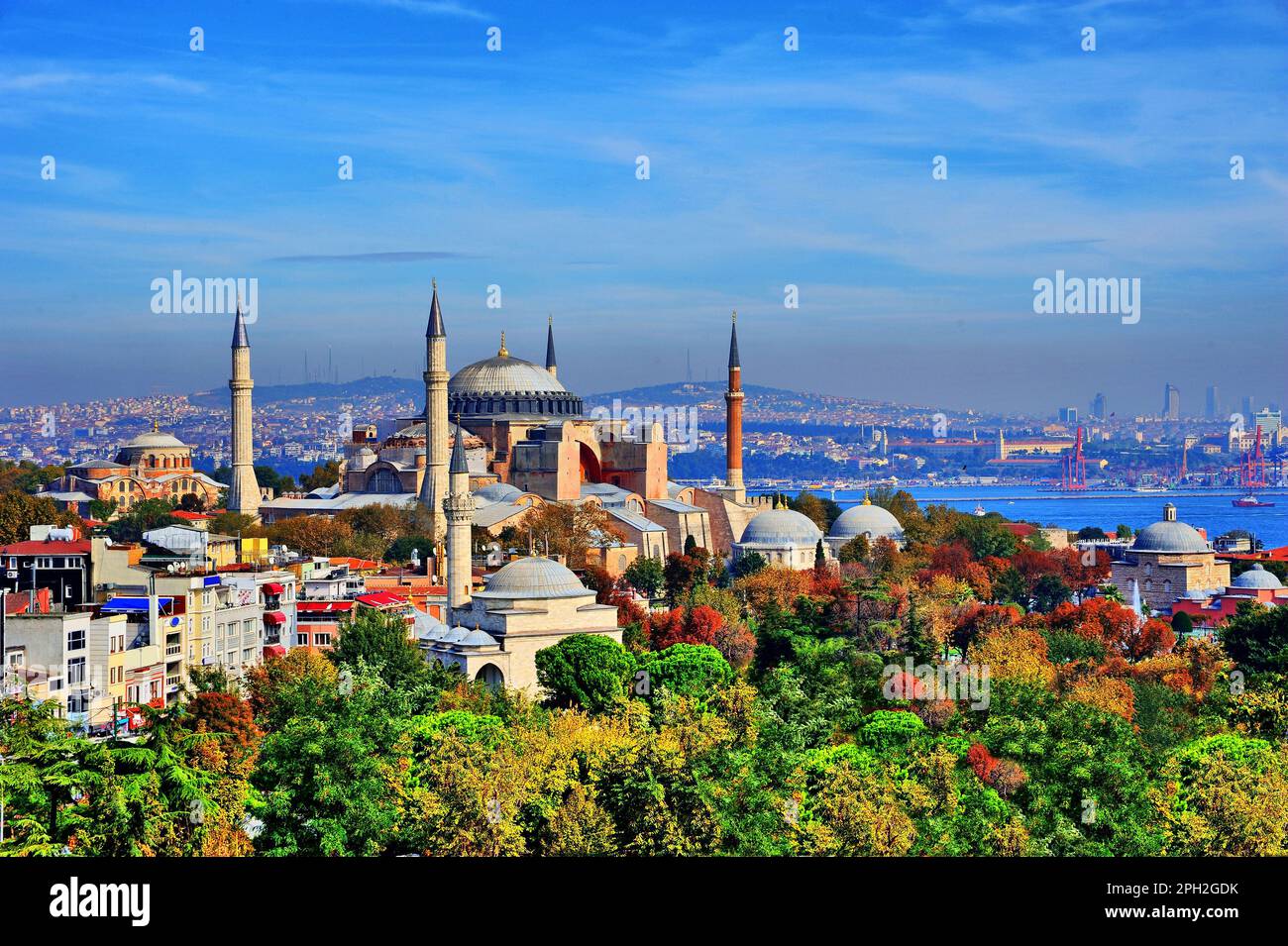 istanbul, view of the haiga sophia with colorful autumn trees in front and a view of the Anatolian side of Istanbul behind Stock Photo