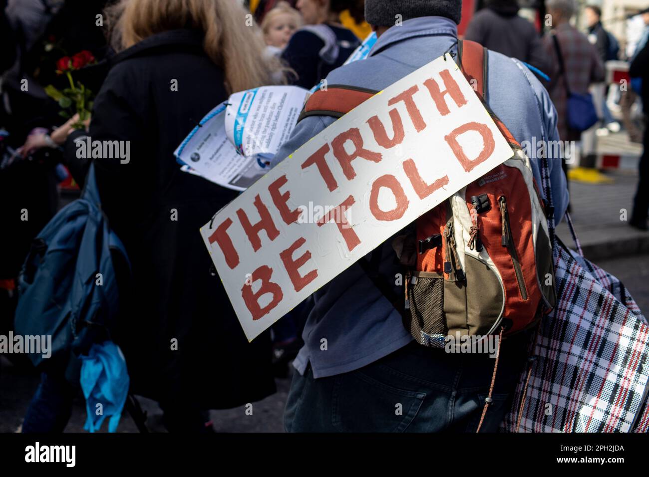 London, UK. 25th Mar, 2023. Hundreds of people marched in Whitehall, claiming that COVID-19 was a hoax perpetuated by big corporations and that vaccines should not be mandatory. They also demanded justice and called for individuals like Matt Hancock to be held accountable in court. Credit: Sinai Noor/Alamy Live News Stock Photo