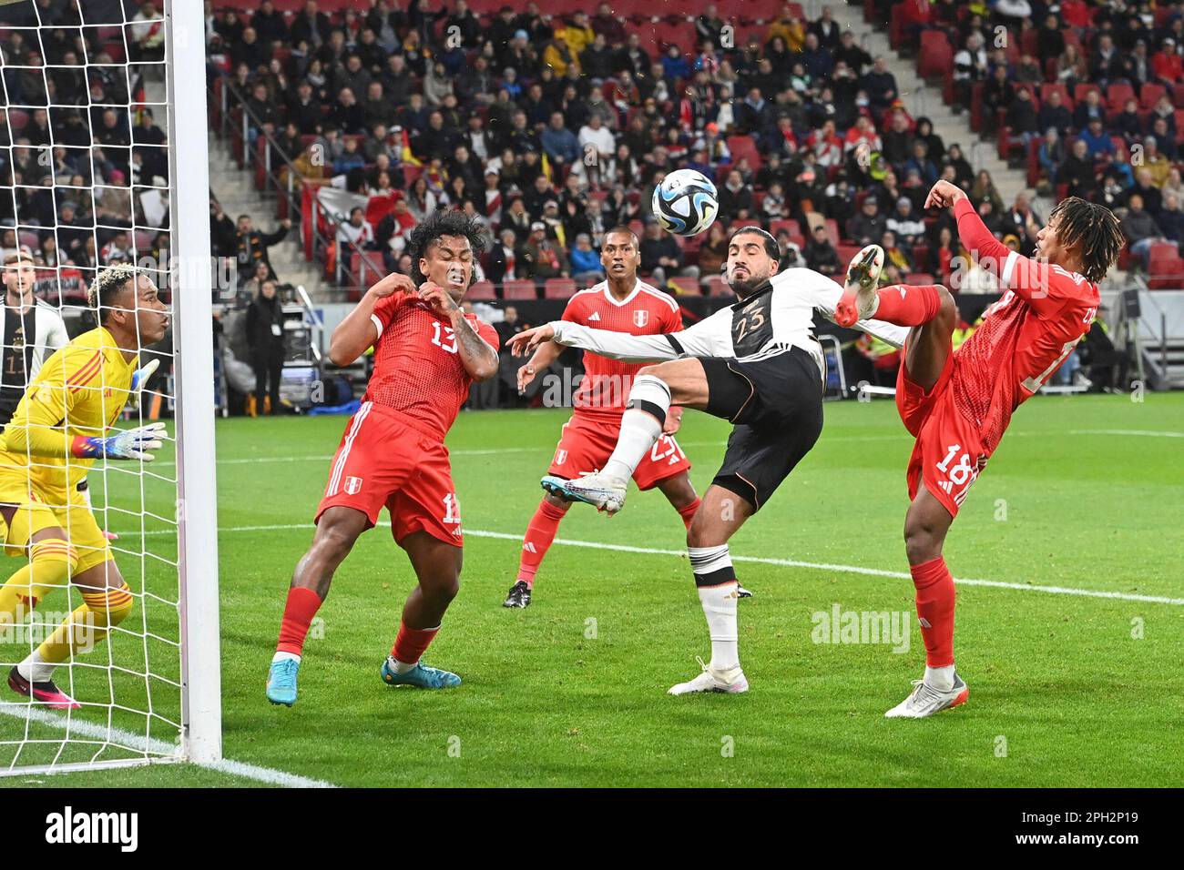 Mainz, Deutschland. 25th Mar, 2023. goalchance Emre CAN (GER), action, duels versus Renato TAPIA (PER) and Andre CARILLO (PER), penalty area scene. Soccer Laenderspiel Germany (GER) - Peru on 25.03.2023, MEWA Arena Mainz? Credit: dpa/Alamy Live News Stock Photo