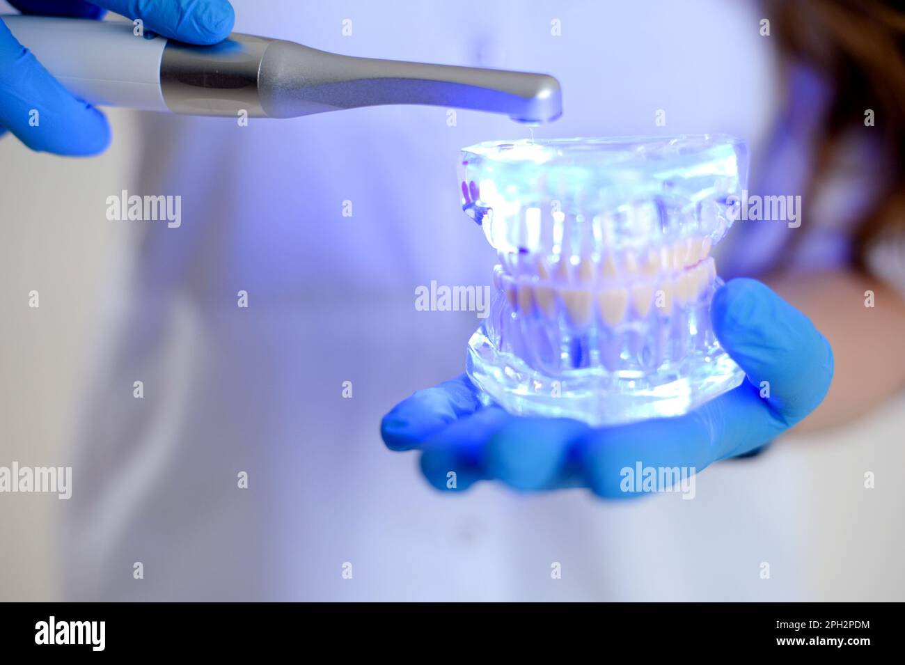 Sterile instruments are in the dentist's office. The mirror and the