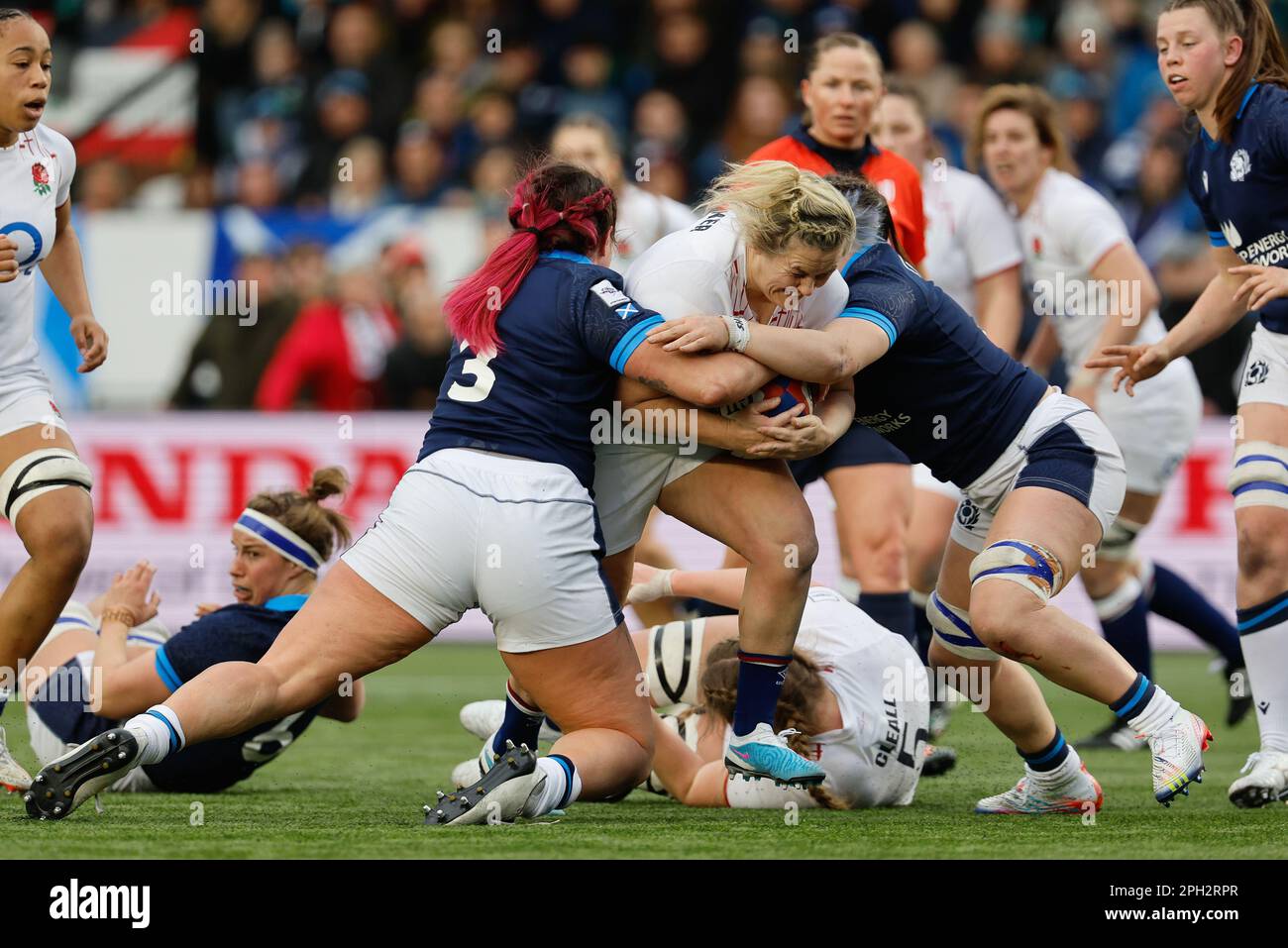 Newcastle on Saturday 25th March 2023. It takes two Scottish defenders to stop Marlie Packer of England during the Tik Tok Women's Six Nations match between England Women and Scotland Women at Kingston Park, Newcastle on Saturday 25th March 2023. (Photo: Chris Lishman | MI News) Credit: MI News & Sport /Alamy Live News Stock Photo