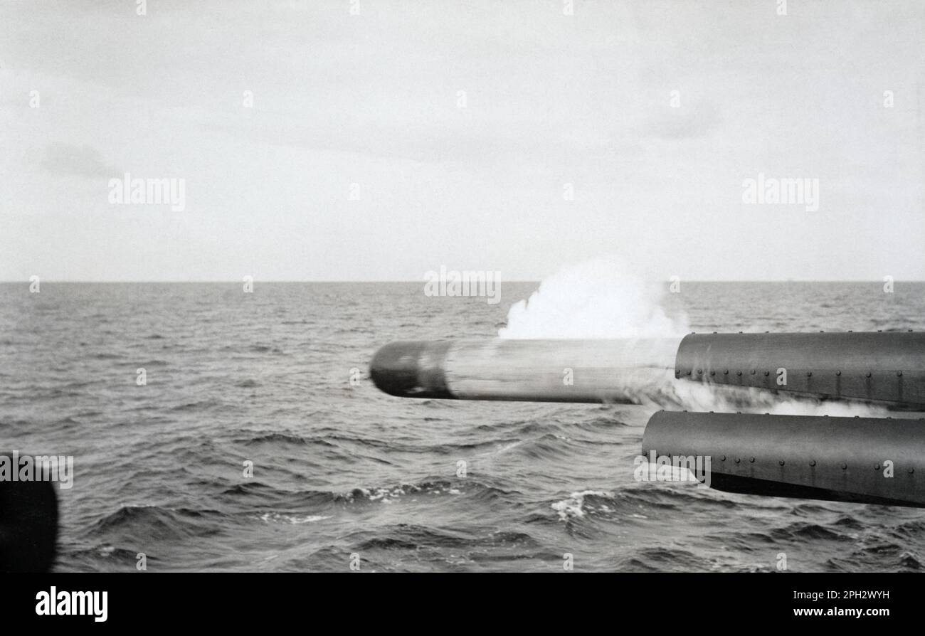 A torpedo being fired by the Royal Navy light cruiser HMS Danae in the ...