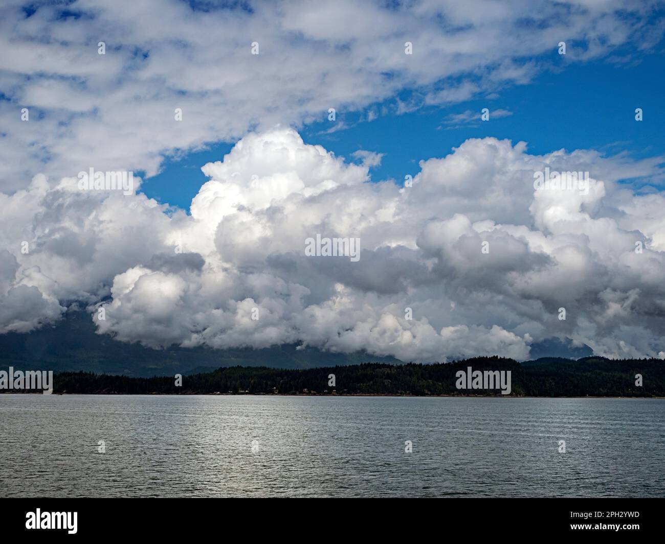 BC0074700...BRITISH COLUMBIA - Clouds over the Coast Range from the Strait of Georgia. Stock Photo