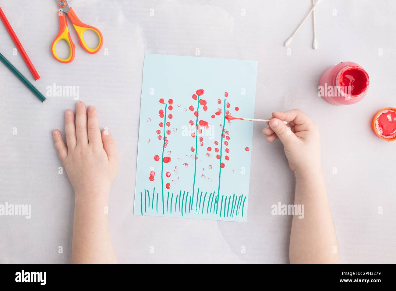 simple kids paper craft painting flowers with cotton buds Stock Photo