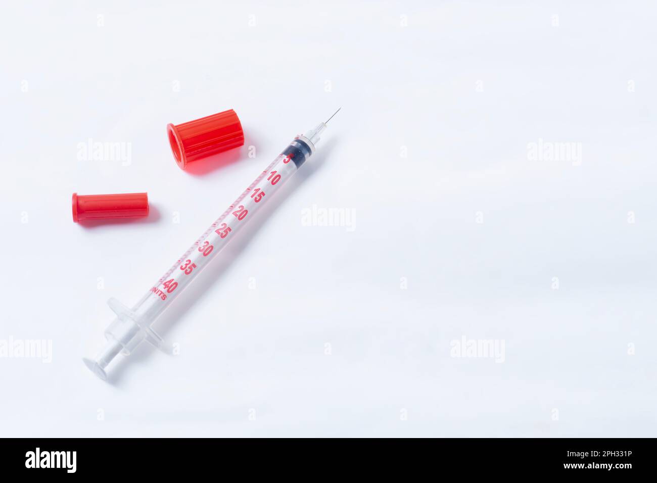 Vaccine vial and syringe isolated on white background Stock Photo - Alamy
