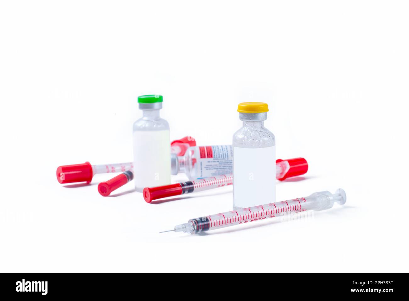 Medical vaccine vials and syringe on white background Stock Photo - Alamy