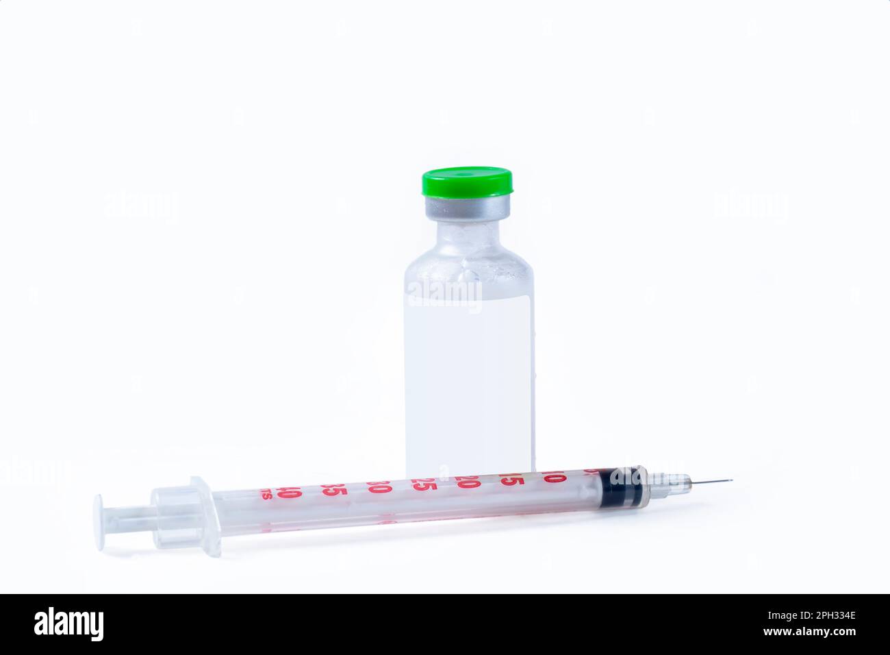 Vaccine vial and syringe isolated on white background Stock Photo - Alamy