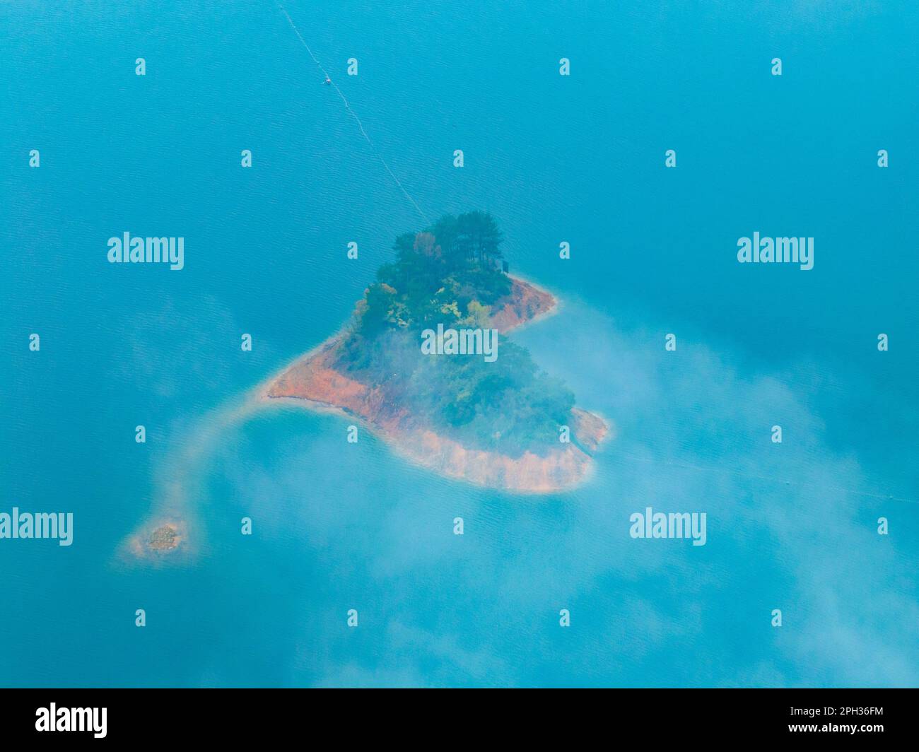 HANGZHOU, CHINA - MARCH 25, 2023 - Aerial photo shows clouds shrouding Thousand Island Lake after rain in Hangzhou, Zhejiang province, China, March 25 Stock Photo