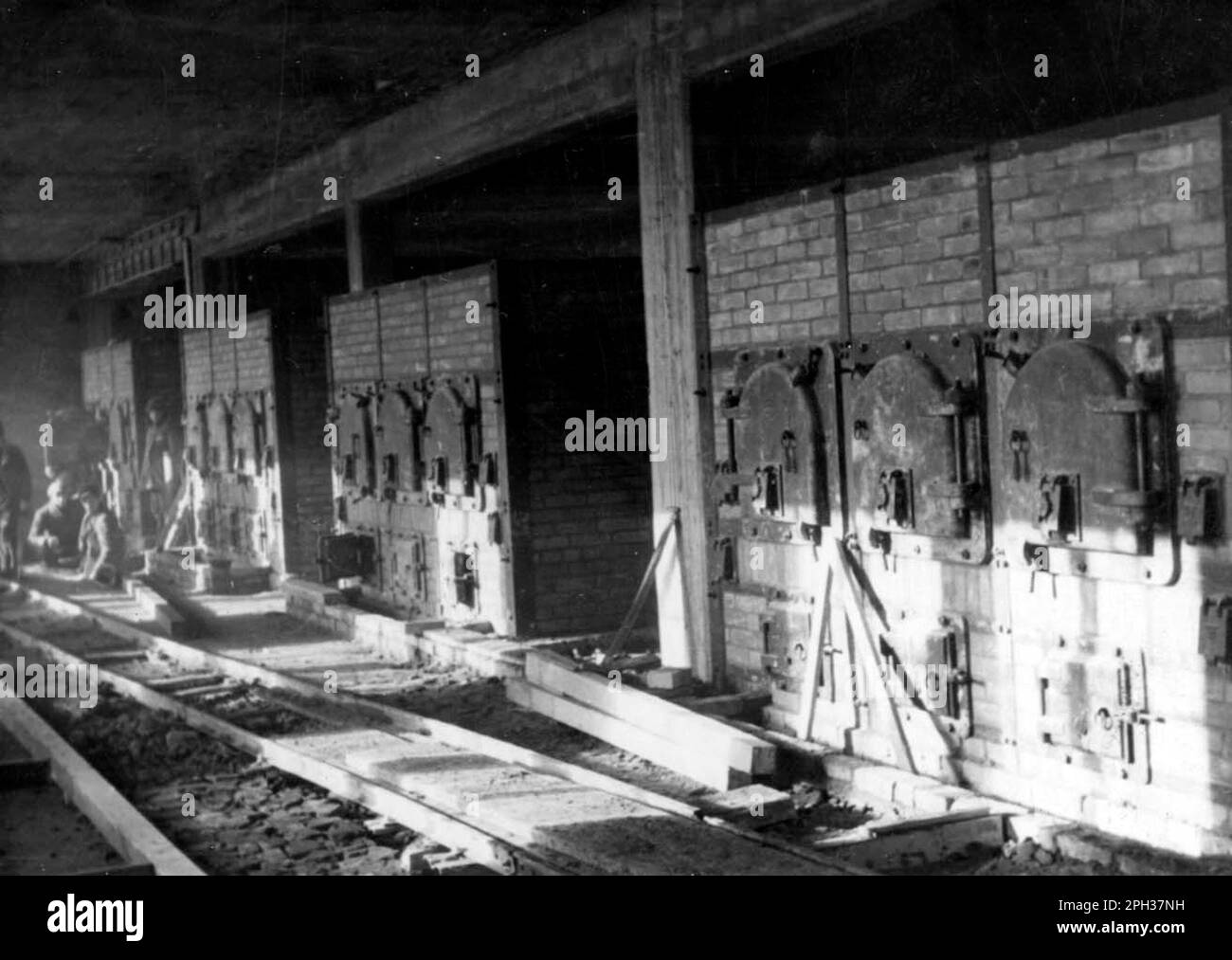 The newly finished furnace room in Crematory II at Auschwitz extermination camp. The picture was taken by the SS right before finishing the bulding in June 1943. Stock Photo