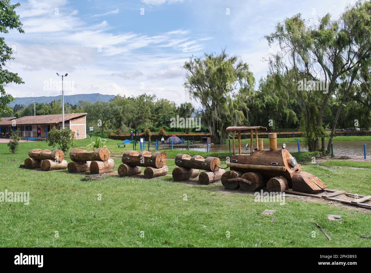 January 22, 2023, Sopo, Cundinamarca, Colombia: little train made of wooden logs in the Sopo Bridge Park, a family place of rest and connection with n Stock Photo