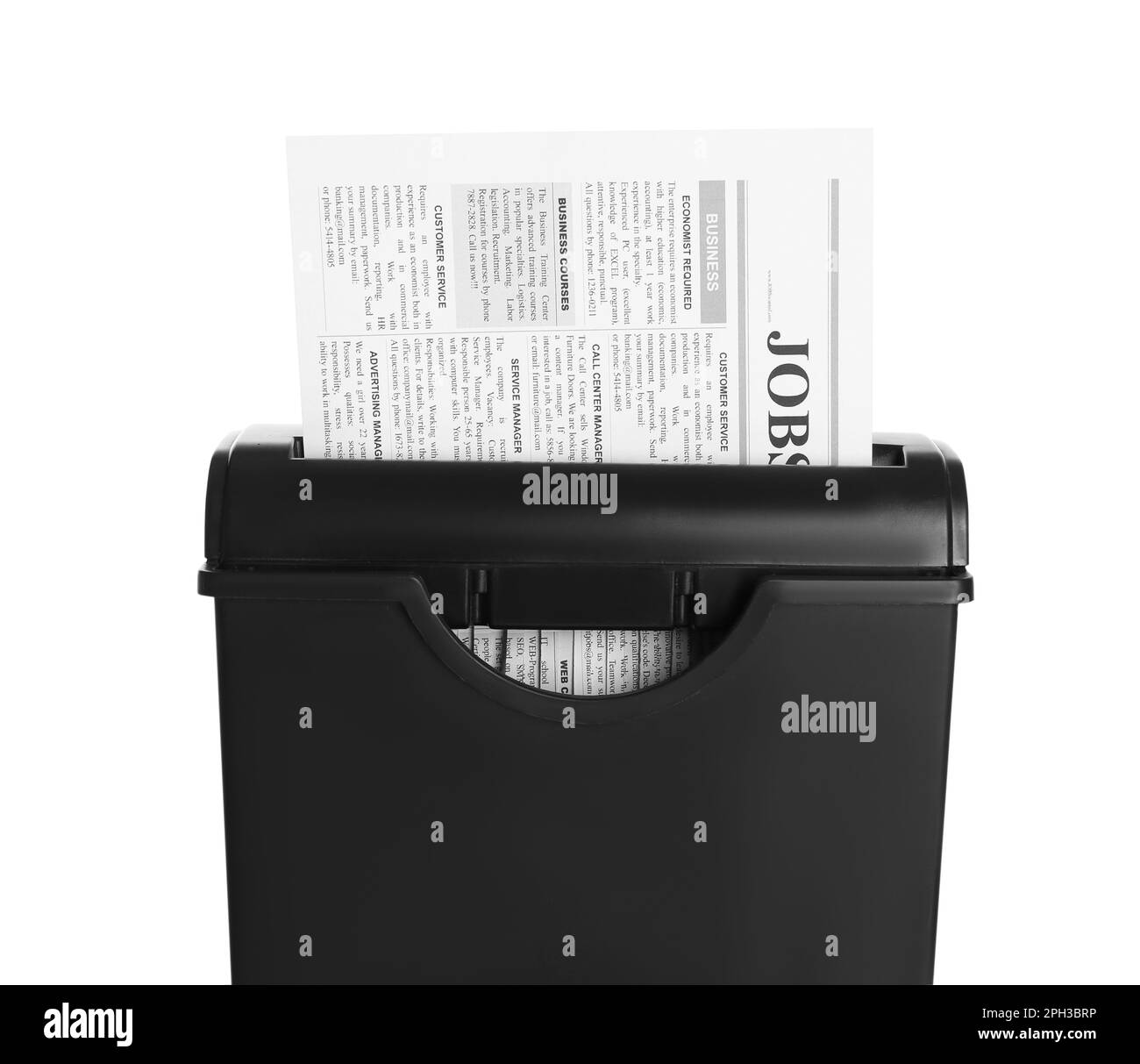 Paper shredder with newspaper isolated on white Stock Photo Alamy