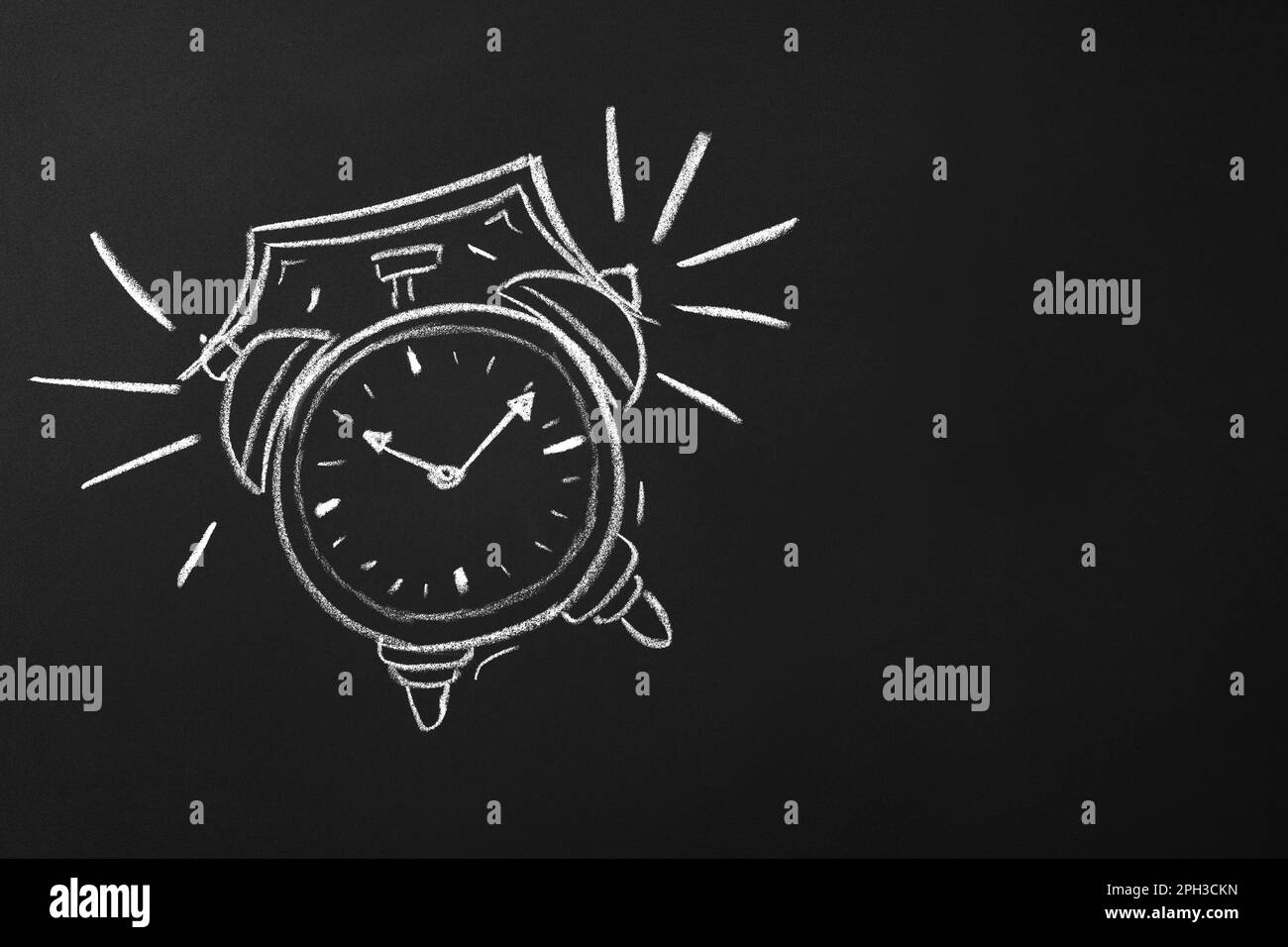 Drawn alarm clock on blackboard, space for text. School time Stock Photo