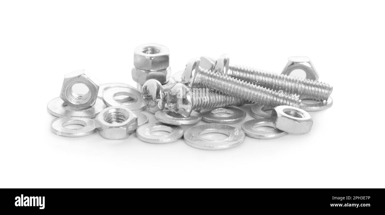 Many metal bolts and nuts on white background Stock Photo