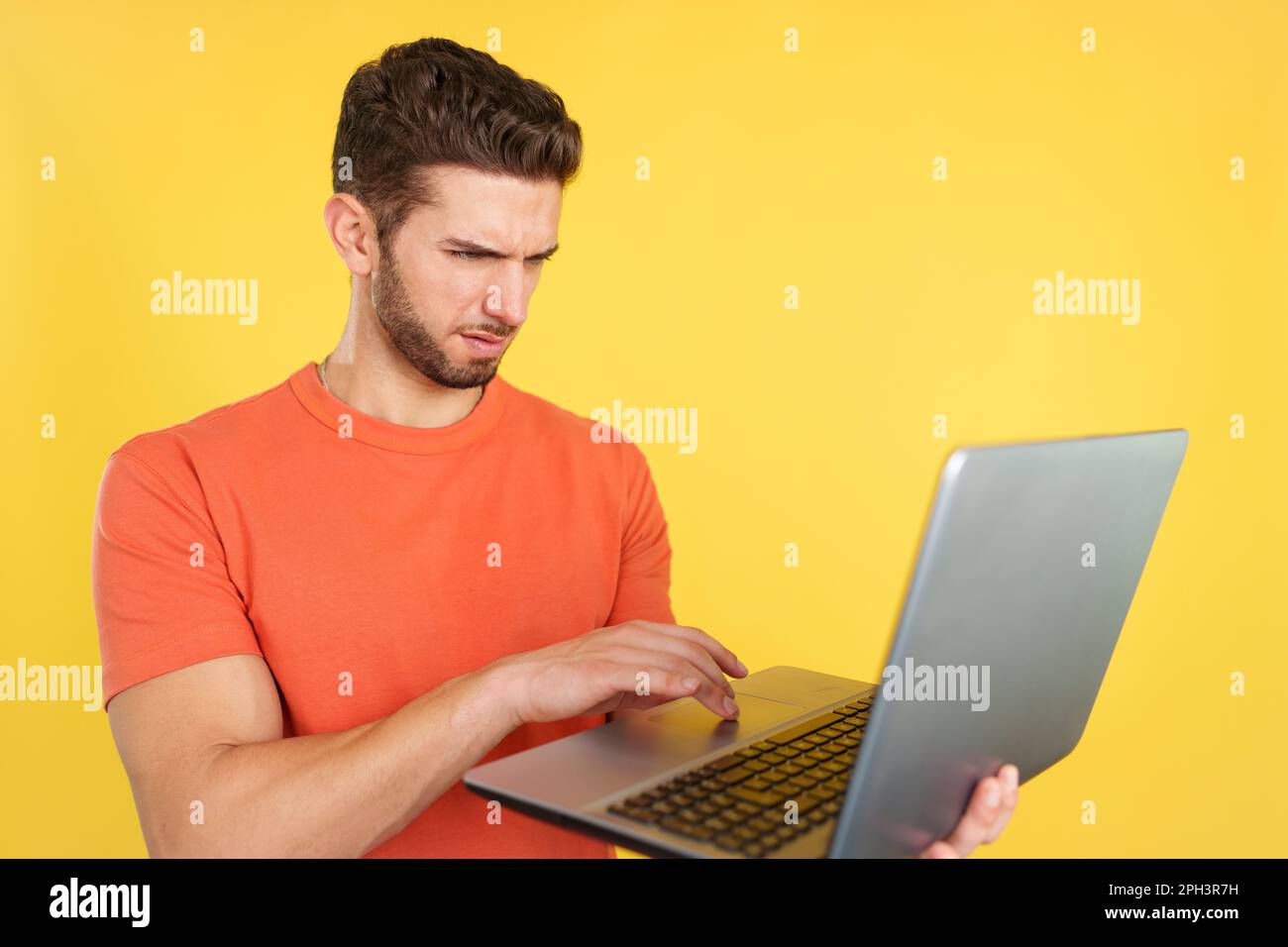 Caucasian man having a problem with a laptop Stock Photo