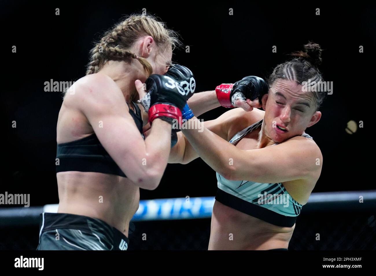 SAN ANTONIO, TEXAS - MARCH 25: (L-R) Andrea Lee punches Maycee Barber