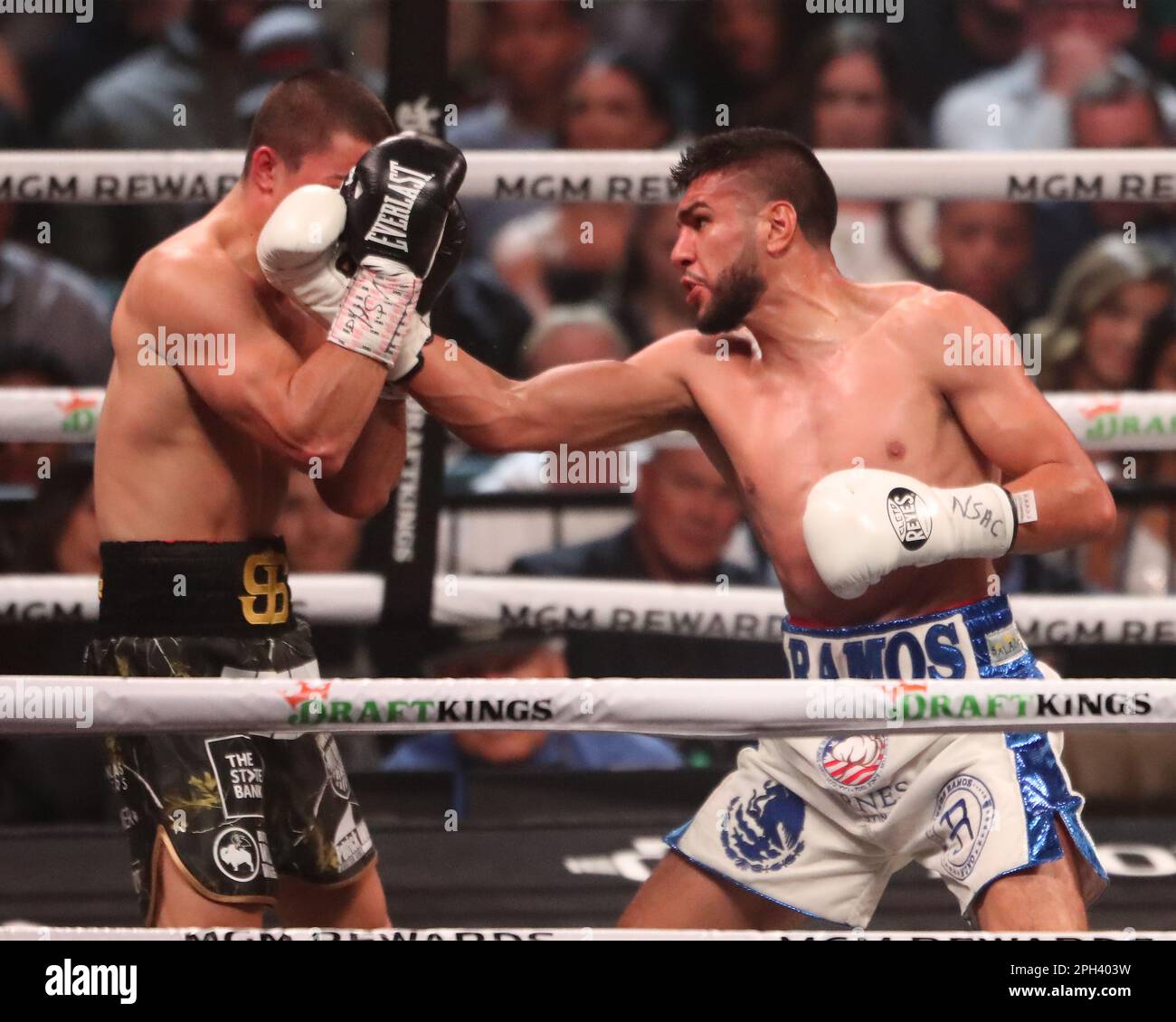 LAS VEGAS, NEVADA - MARCH 25: (R-L) Jesus Ramos punches Joseph Spencer ...