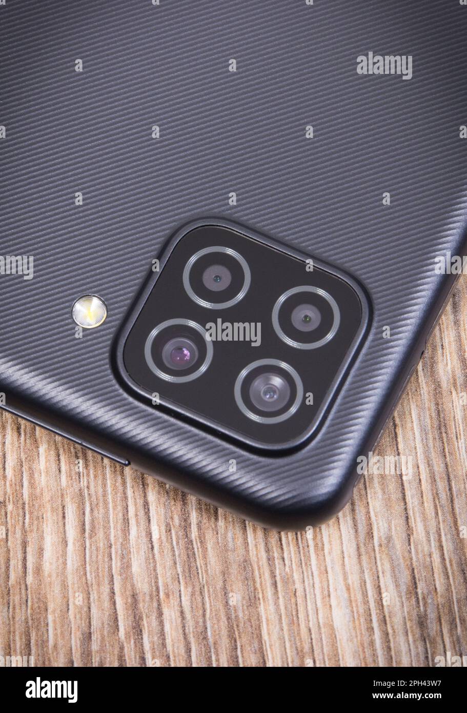 Camera lens in smartphone or mobile phone. Modern technology using in