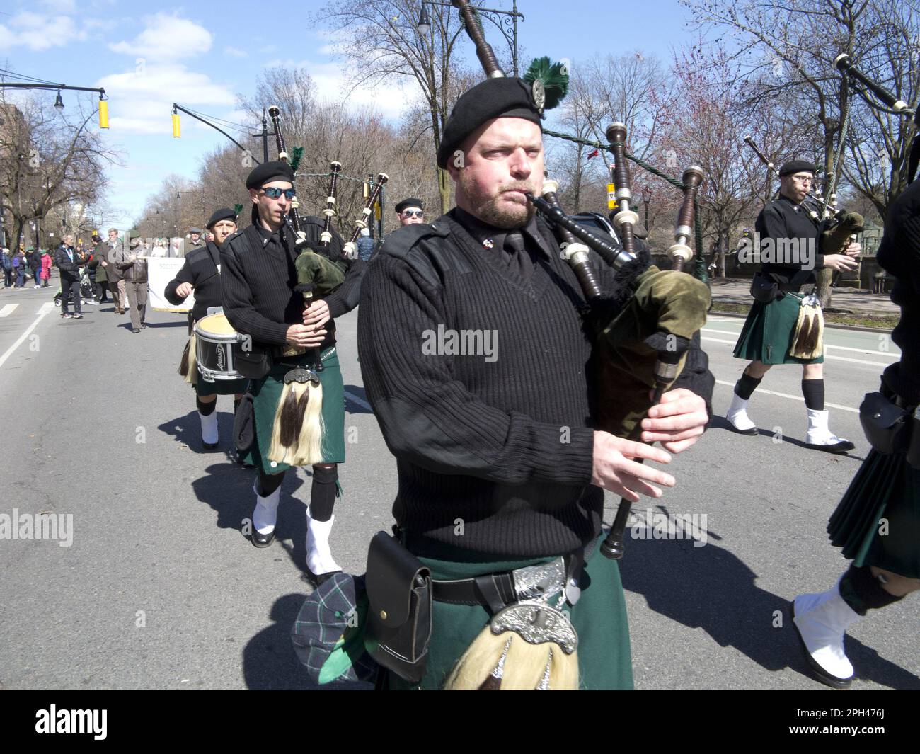 Members of Pipes and Drums band perform at St.Patrick's Day Parade in Park Slope, Brooklyn, NY Stock Photo