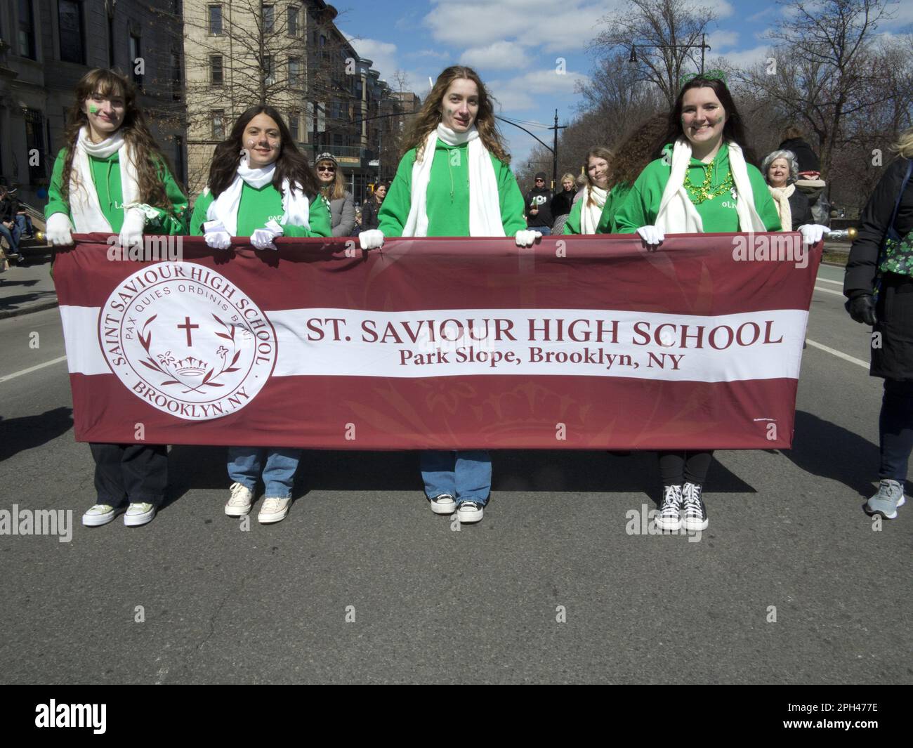 High School girls march in St.Patrick's Day Parade in Park Slope, Brooklyn, NY Stock Photo