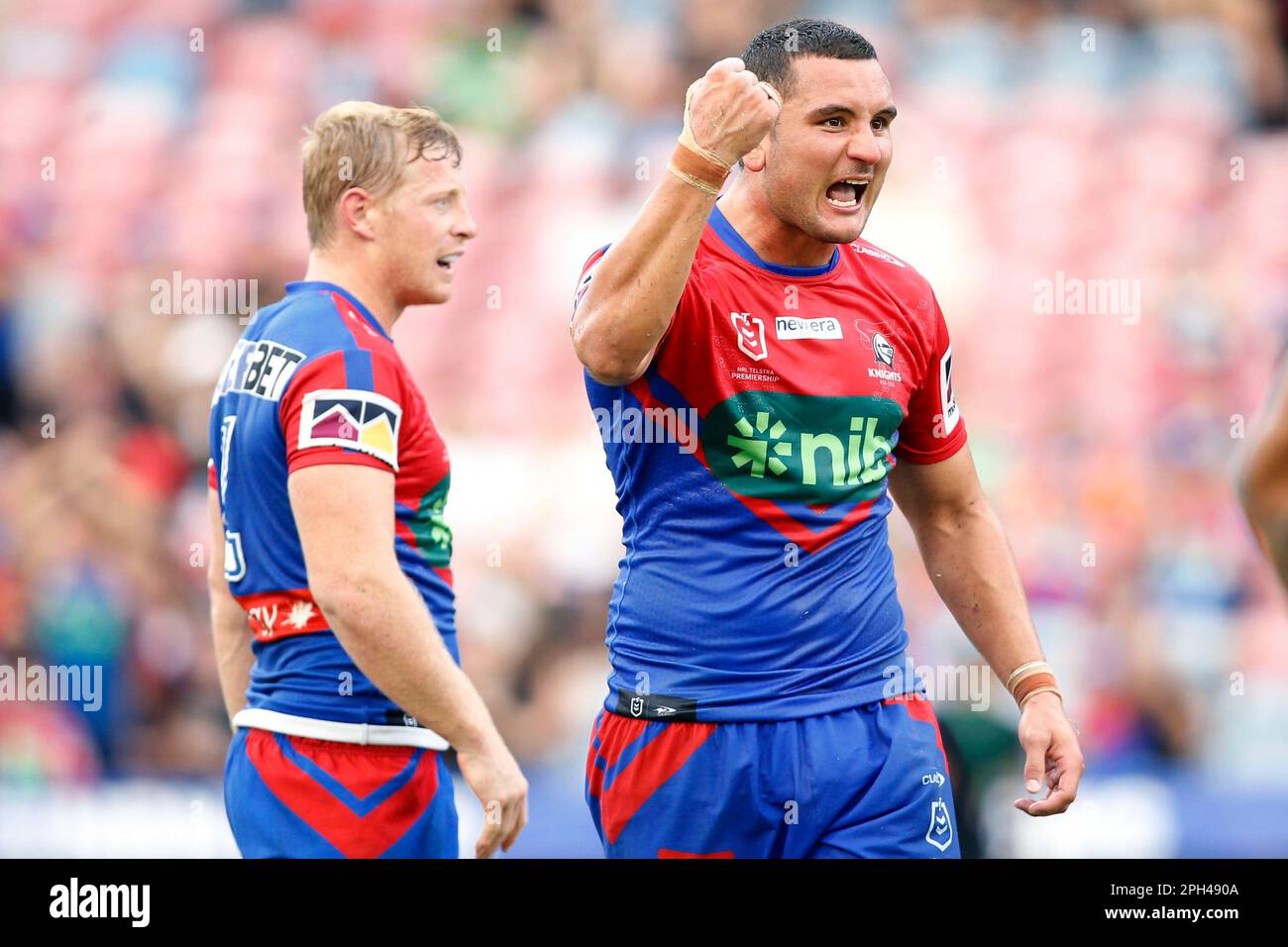 Knights players celebrate their win after the NRL Round 4 match between the Newcastle  Knights and the Canberra Raiders at McDonald Jones Stadium in Newcastle,  Sunday, March 26, 2023. (AAP Image/Darren Pateman)
