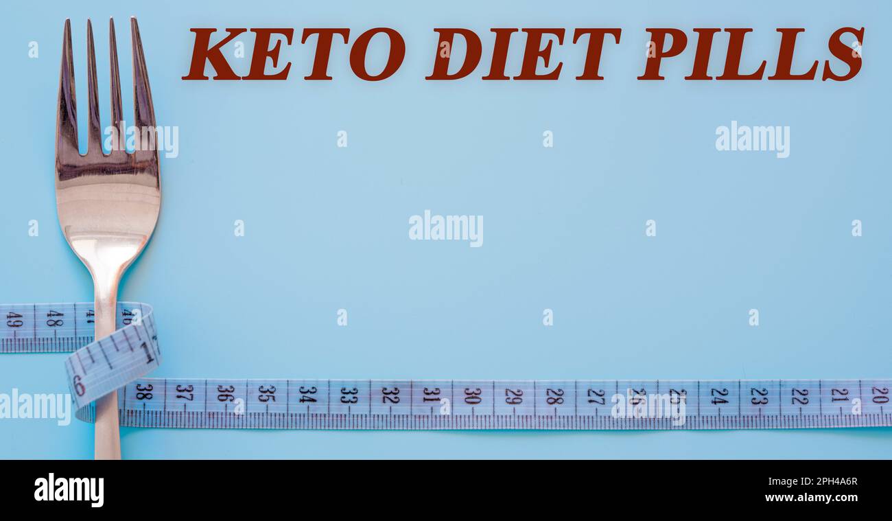Diet text on flat lay background keto diet pills Stock Photo