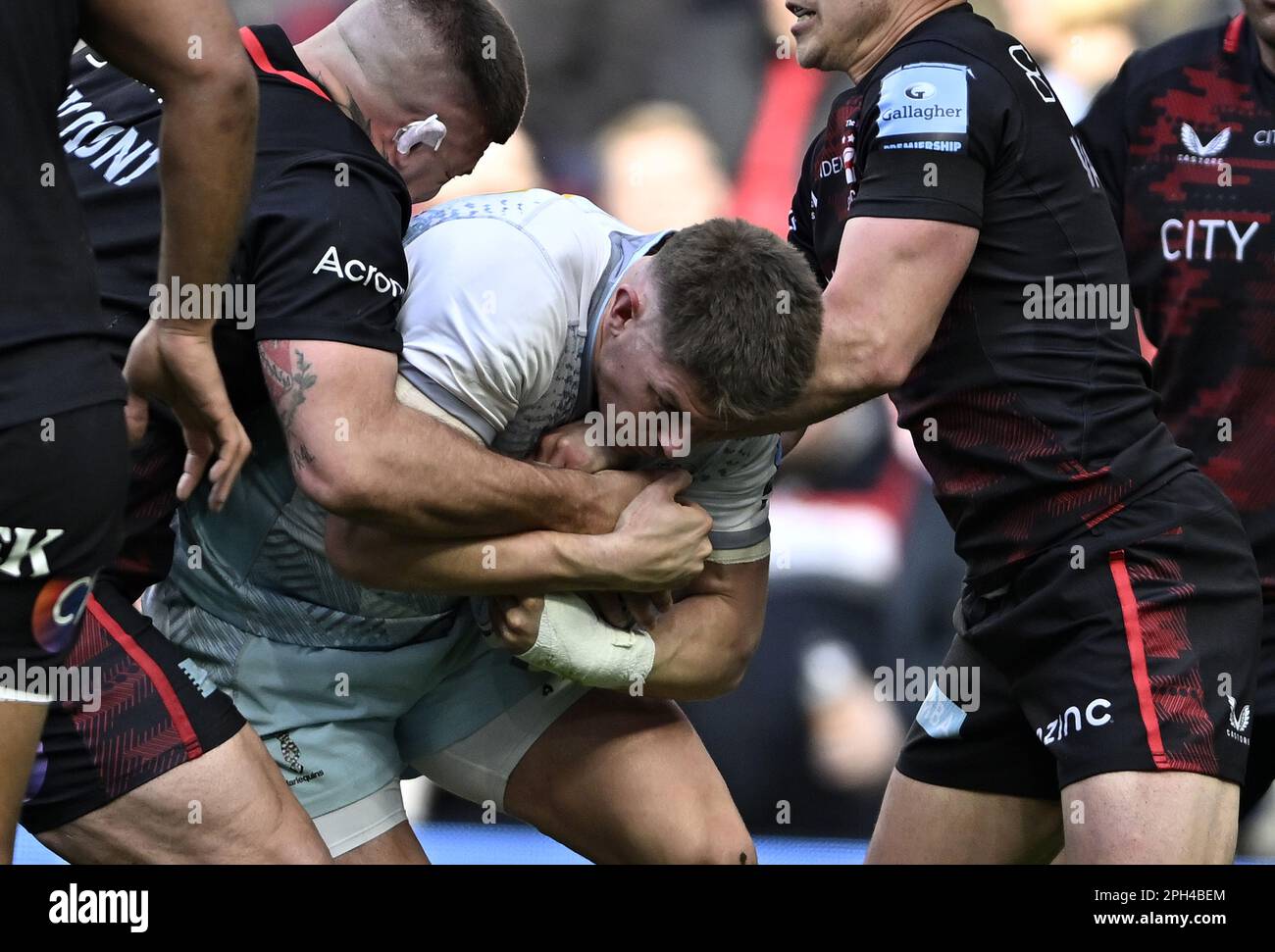 Tottenham, United Kingdom. 25th Mar, 2023. Premiership Rugby. Saracens V Harlequins. The Tottenham Hotspur Stadium. Tottenham. Luke Northmore (Harlequins) is tackled during the Showdown 3, in Association with City Index, Saracens V Harlequins Gallagher Premiership rugby match. Credit: Sport In Pictures/Alamy Live News Stock Photo