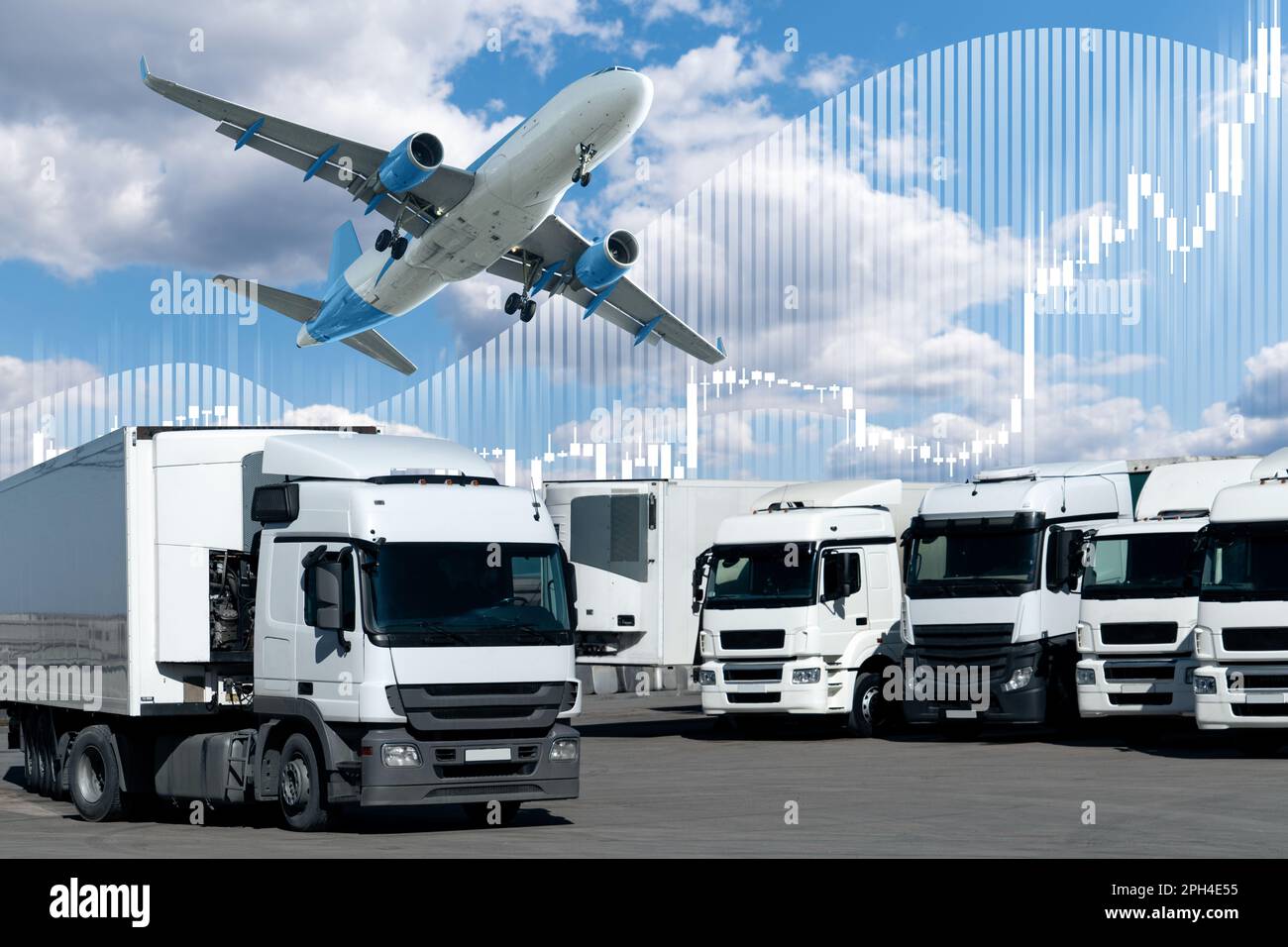 Airplane in the sky above the trucks. World trade and transportation concept Stock Photo