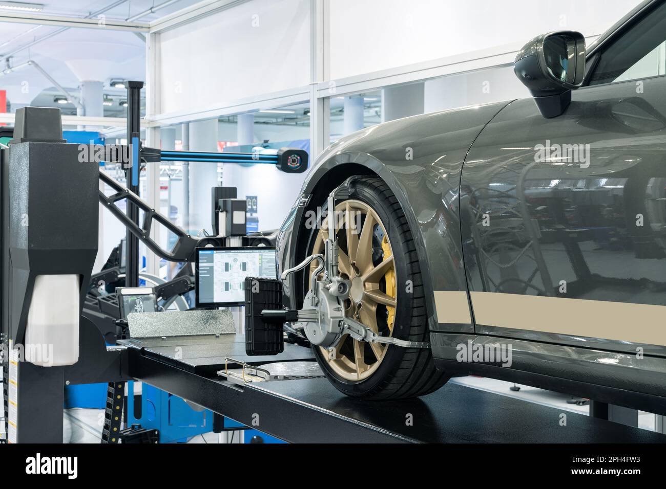 Wheel alignment in car service. High quality photo Stock Photo