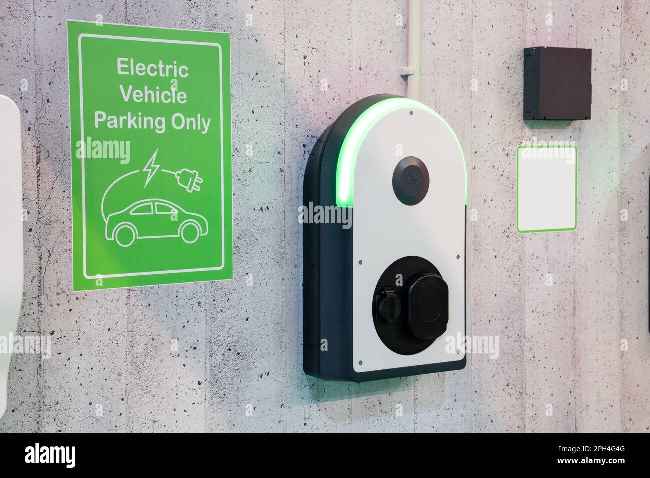 Charging stations for electric vehicles on a wall. High quality photo Stock Photo