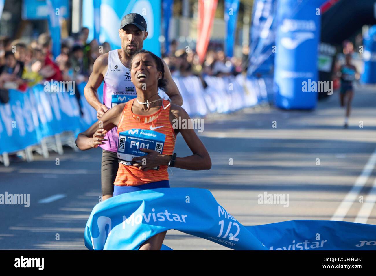 The winning female athlete, Zewditu Aderaw Gelaw, arrives at the finish line of the Movistar