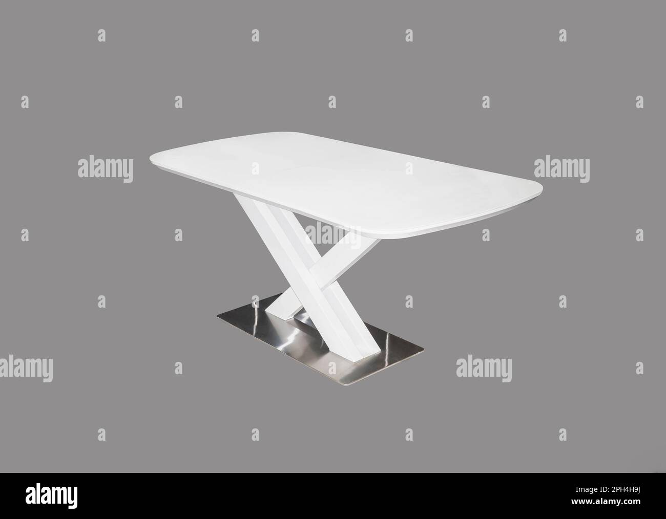 White dining table with metal leg. Interior element Stock Photo Alamy