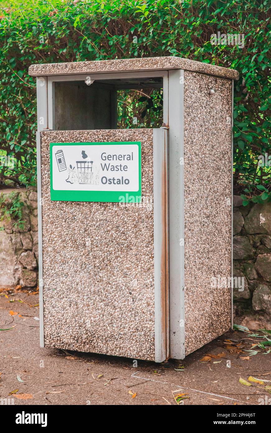 Garbage bin decorated by stone chips for all waste in Slovenia Stock