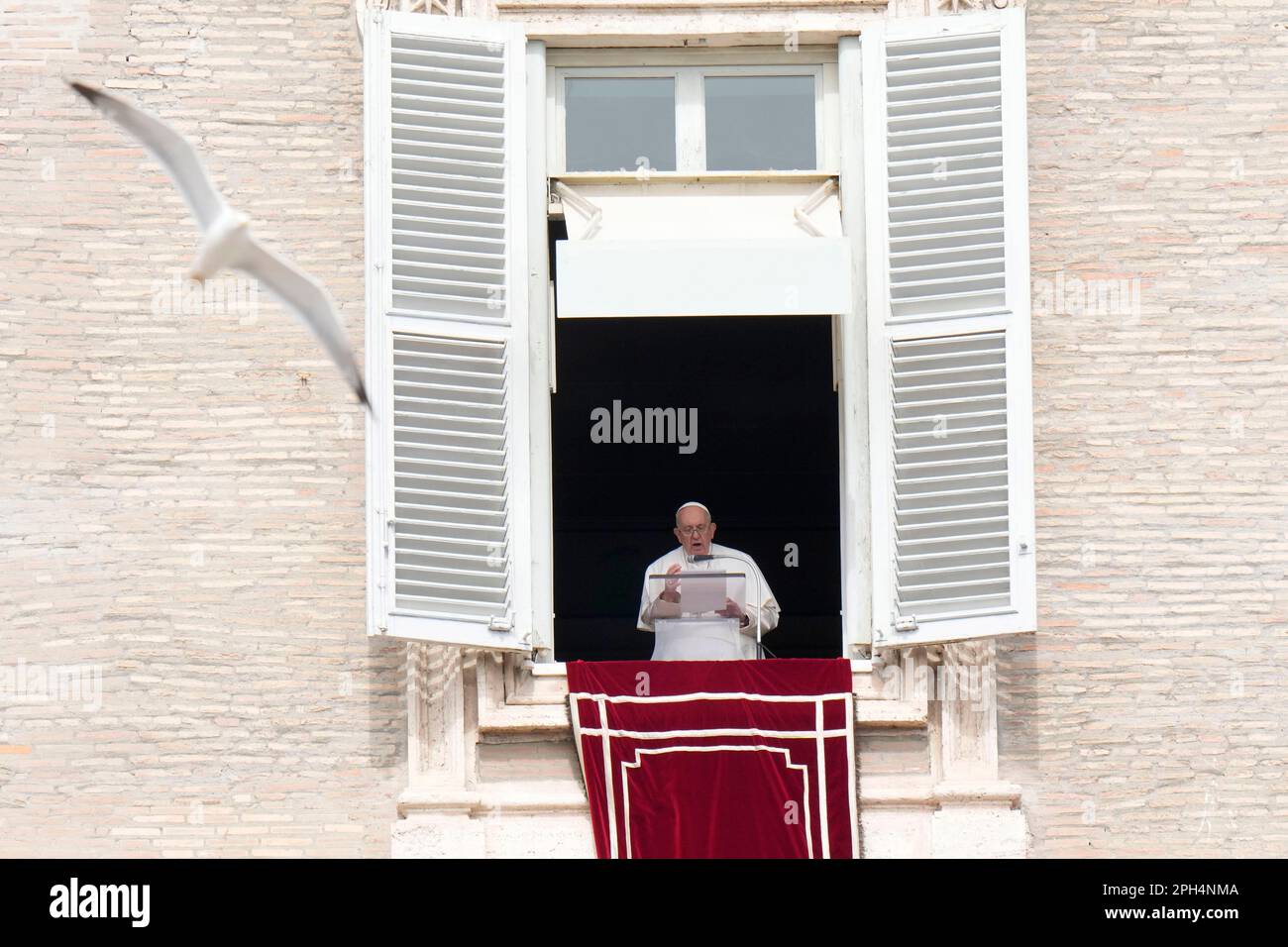 Pope Preaching Window Pope Francis delivers his speech during the Angelus noon prayer from ...