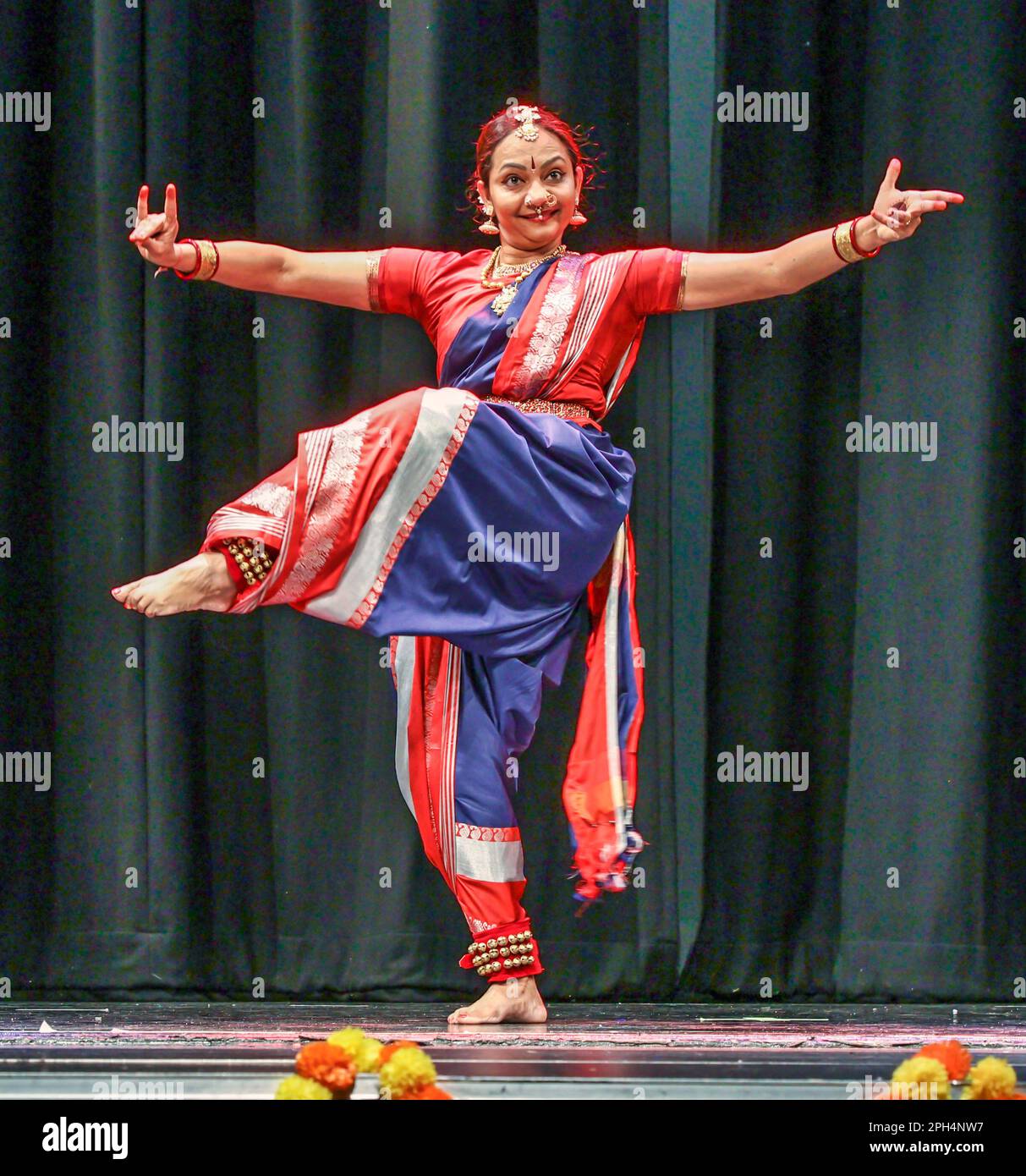 London, UK. 26th Mar, 2023. Sarjan Nartan Academy UK LTD a London based Indian Dance school, whose aim is to keep customs and Indian culture alive performing Indian dances, like Bharatnataym, Folk Dances, Bollywood, Zumbollic at the Great Hall, Hatchend High School, Harrow. Credit: Paul Quezada-Neiman/Alamy Live News Stock Photo