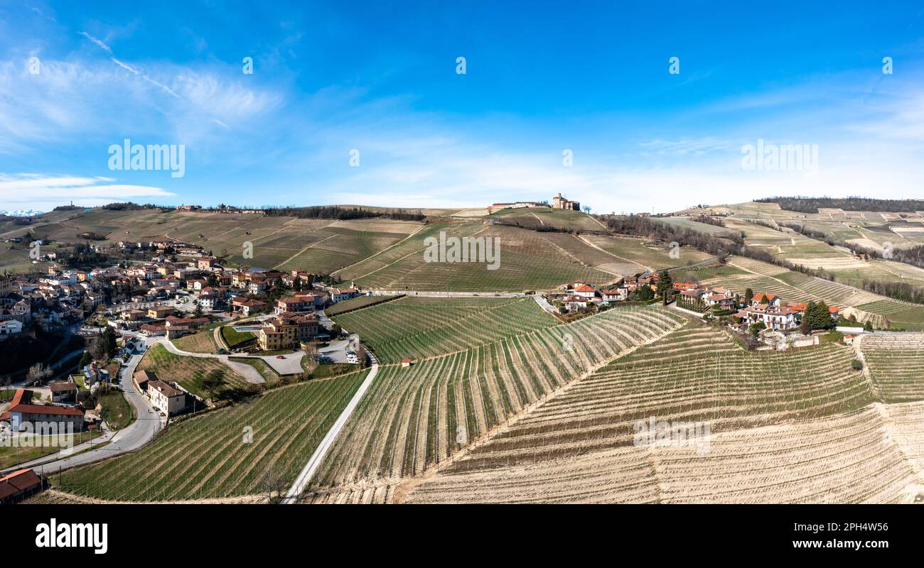 A view of typical vineyards and villages in the Italian Piedmont region near Barolo Stock Photo
