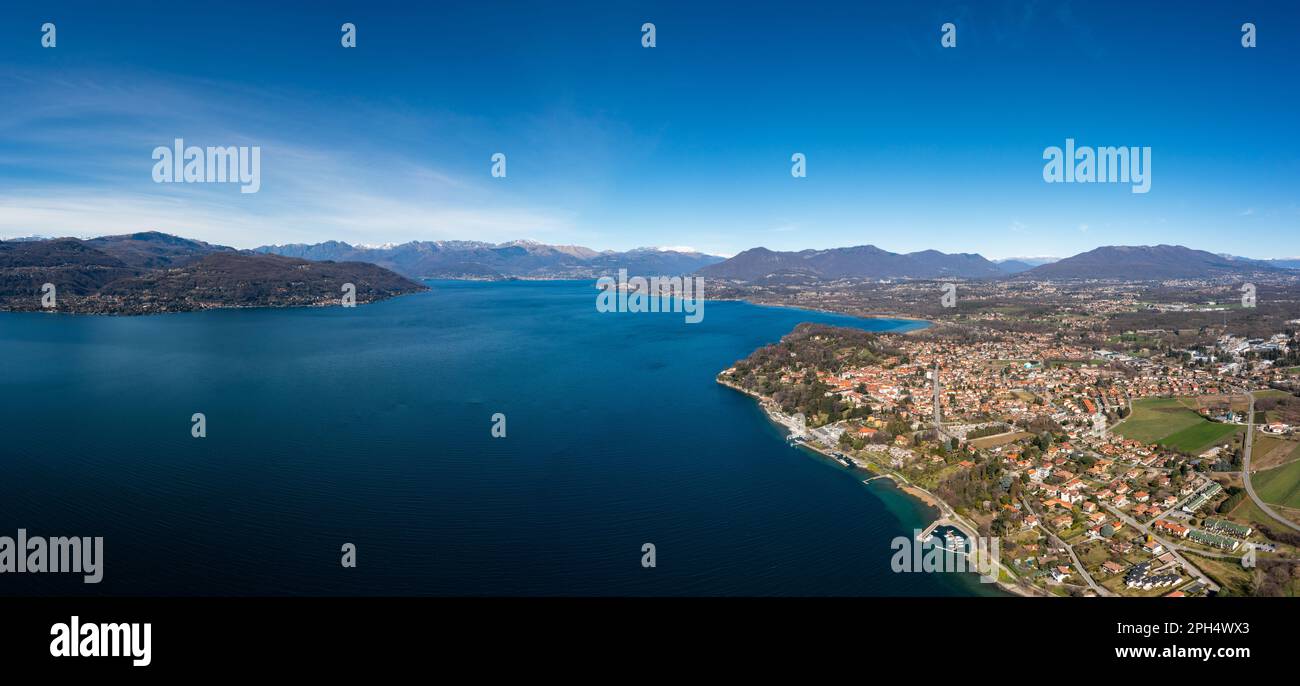Drone landscape panorama of Lake Maggiore in the Italian Lake District and the village of Ispra Stock Photo
