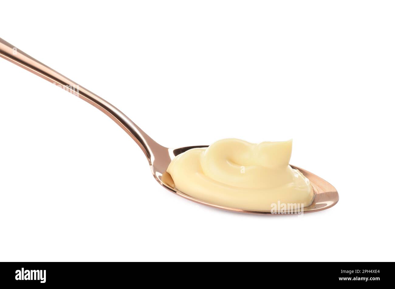 Spoon with tasty mayonnaise isolated on white Stock Photo Alamy