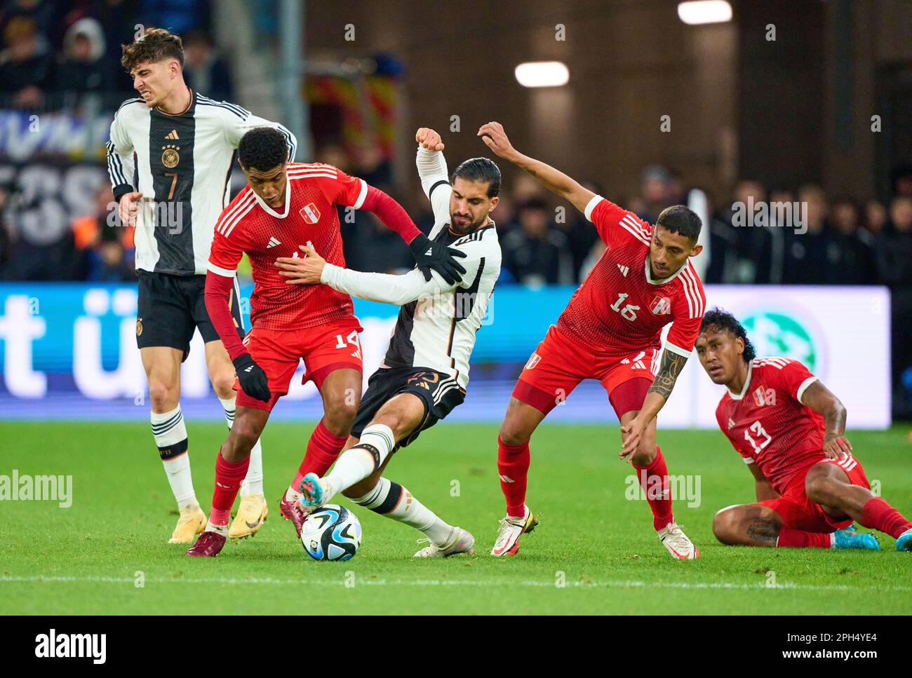 Emre Can, DFB 23  compete for the ball, tackling, duel, header, zweikampf, action, fight against Wilder Cartagena, Peru 14 Christopher Gonzales, Peru 16 Renato Tapia, Peru 13  in the friendly match GERMANY - PERU 2-0 Preparation for European Championships 2024 in Germany ,Season 2022/2023, on Mar 25, 2023  in Mainz, Germany.  © Peter Schatz / Alamy Live News Stock Photo