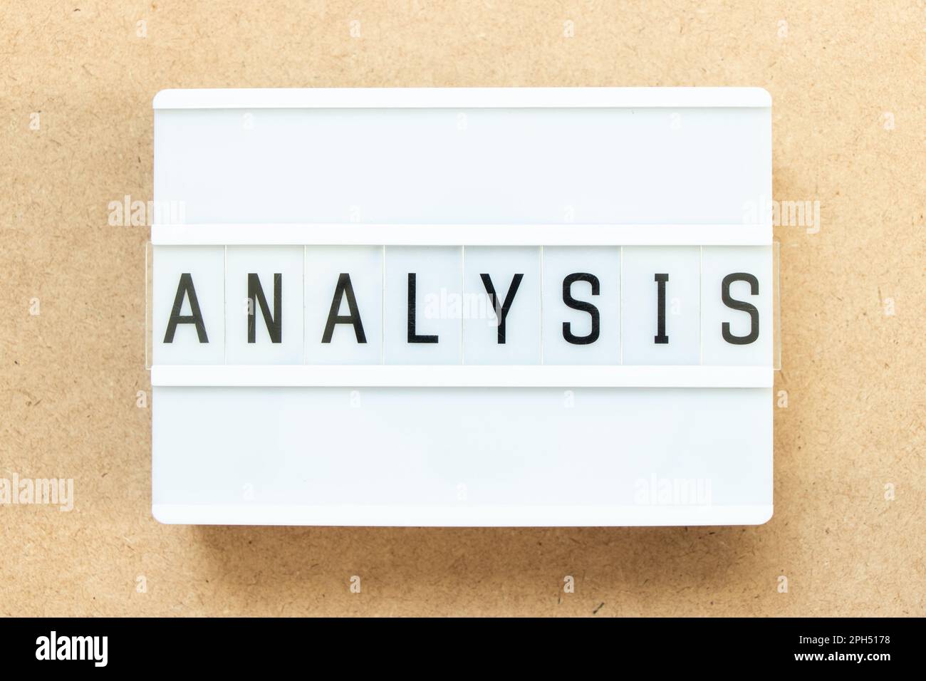 Lightbox with word analysis on wood background Stock Photo
