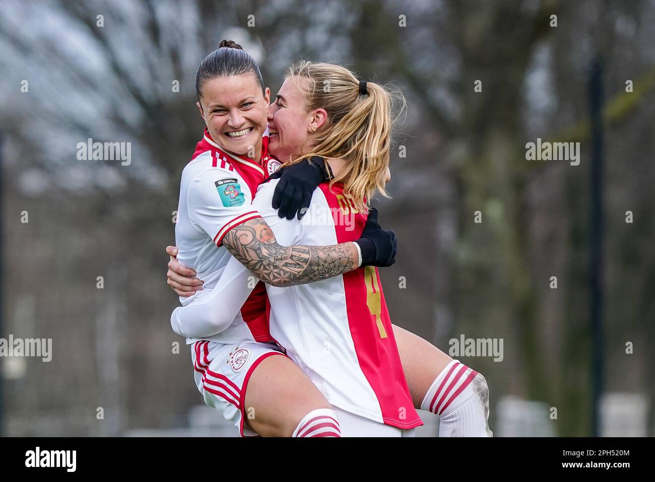Amsterdam, Netherlands. 26th Mar, 2023. AMSTERDAM, NETHERLANDS - MARCH 26: Sherida Spitse of Ajax and Lisa Doorn of Ajax celebrates the third goal during the Azerion Eredivisie Vrouwen match between Ajax and vv Alkmaar at Sportcomplex De Toekomst on March 26, 2023 in Amsterdam, Netherlands (Photo by Jeroen Meuwsen/Orange Pictures) Credit: Orange Pics BV/Alamy Live News Stock Photo